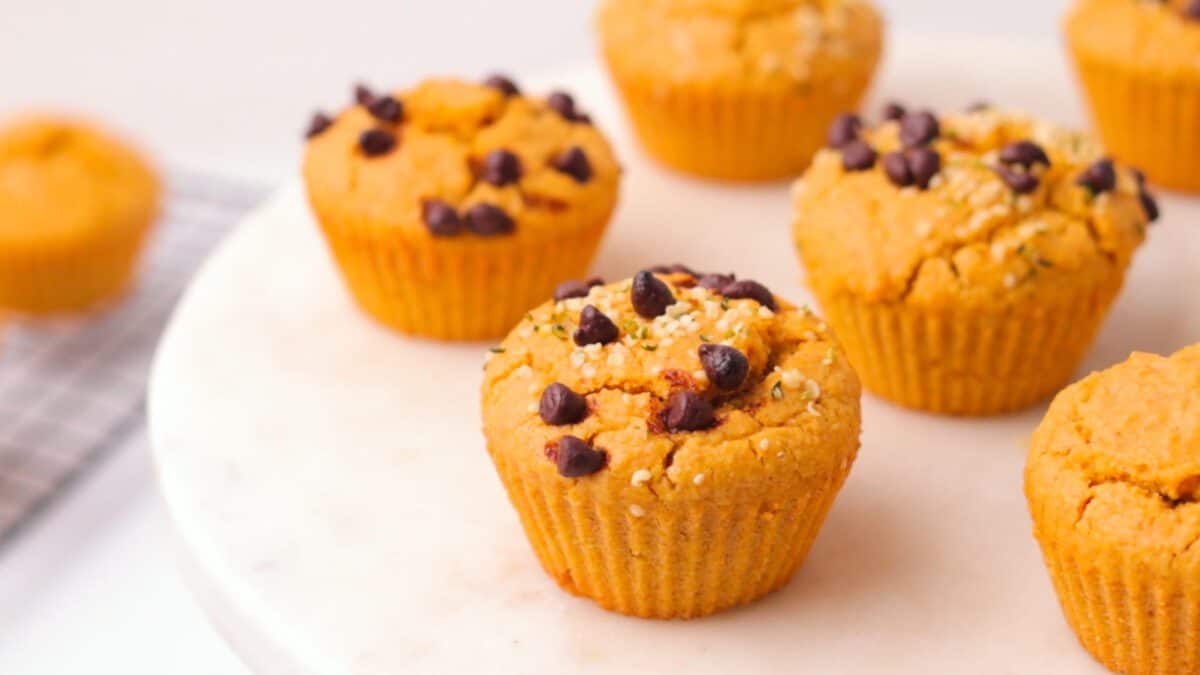 Easy Vegan Blender Sweet Potato Muffins on a white platter.