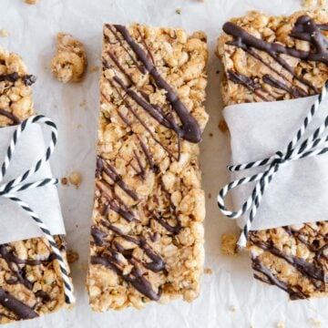 Homemade cereal bars with a white background.