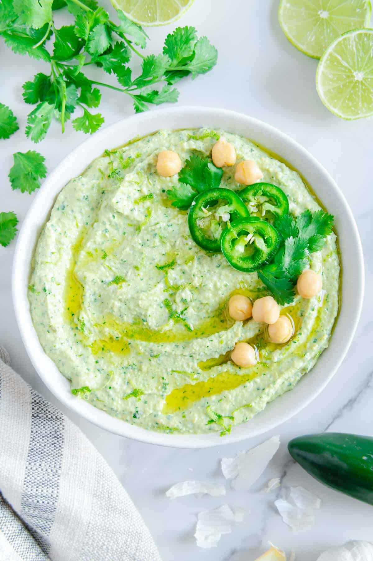 Cilantro Hummus with Jalapeno Eating by Elaine