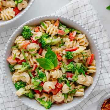 Tahini pasta in a white bowl with a white background.