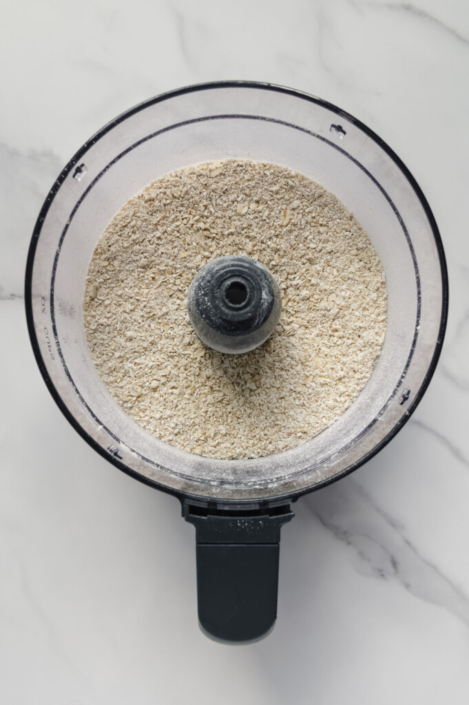 Oats in a food processor after processing.