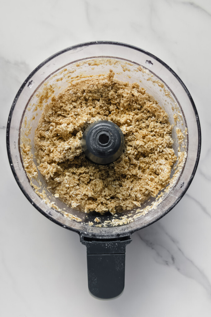 Homemade Heavenly Hunks ingredients processed in a food processor.