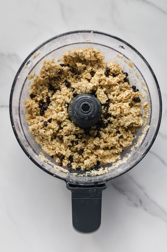 Homemade Healthier Hunks mixture in a food processor after processing.