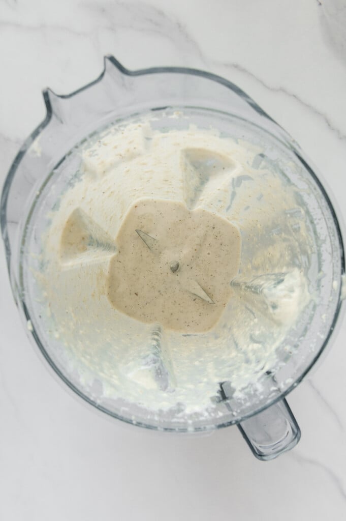 Vegan Italian dressing in a blender after blending.