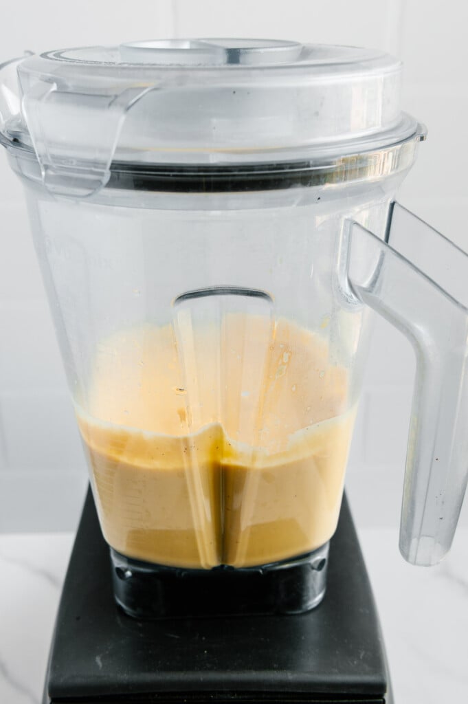 Vegan cheese sauce in a blender after blending.
